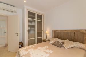 Posteľ alebo postele v izbe v ubytovaní Colonia de Sant Pere - 31506