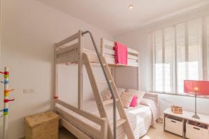 Posteľ alebo postele v izbe v ubytovaní Colonia de Sant Pere - 31506