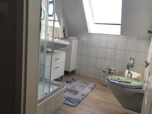 Koupelna v ubytování Residenz am Peeneplatz