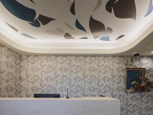 a room with a ceiling with a painting on it at 3rd PLACE by HIDEOUT in Fujisawa