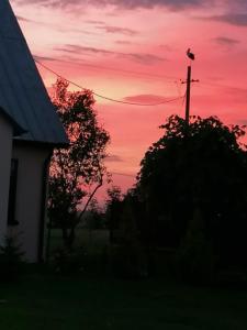 Răsăritul sau apusul soarelui văzute de la sau din apropierea acestei case de vacanță +12 fotografii
