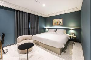 Postel nebo postele na pokoji v ubytování Brown Dot Hotel Ulsan Jangsaengpo