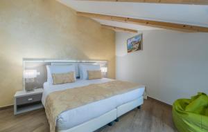 a bedroom with a large bed in a room at Boutique Hotel Melissa in Poreč