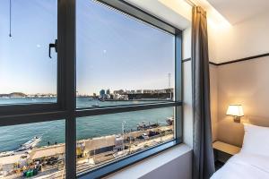 Postel nebo postele na pokoji v ubytování Brown Dot Hotel Ulsan Jangsaengpo