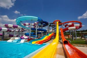 a water park with a colorful water slide at Apartament 3 camere central decomandat lux in Oradea +1 photo