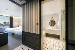Postel nebo postele na pokoji v ubytování Brown Dot Hotel Ulsan Jangsaengpo