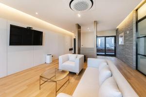 TV a/nebo společenská místnost v ubytování Brown Dot Hotel Ulsan Jangsaengpo