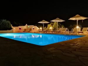 The swimming pool at or close to Cavo Plako Villas