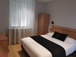 Postel nebo postele na pokoji v ubytování Château Blanchard