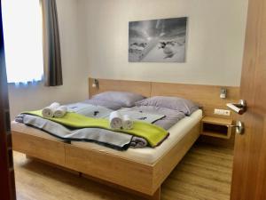 Posteľ alebo postele v izbe v ubytovaní valbel