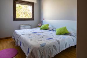 A bed or beds in a room at AH El Rincón de la Villa VUT713AS