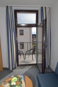 Ein Balkon oder eine Terrasse in der Unterkunft Gästehaus Germania