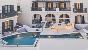 an image of a house with a swimming pool at Parian Boutique Hotel in Naousa