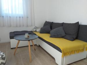 Posezení v ubytování Apartment Sučić