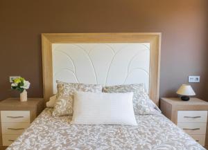 A bed or beds in a room at AH El Rincón de la Villa VUT713AS