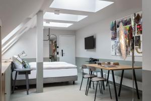 Postel nebo postele na pokoji v ubytování Sorell Hotel City Weissenstein - Boutique Hotel