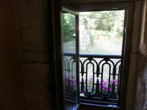 A balcony or terrace at Os NOVOS