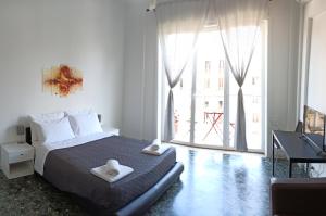 Postel nebo postele na pokoji v ubytování Cavour 133