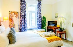 Letto o letti in una camera di Hotel Bel Air Trail & Wellness
