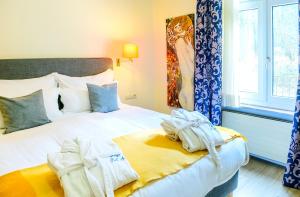 Letto o letti in una camera di Hotel Bel Air Trail & Wellness