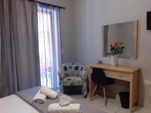 A bed or beds in a room at Nini's House 2 - 100m from beach NIDRI TOWN CENTER