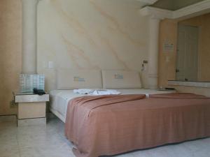 Cama o camas de una habitación en Motel Costa