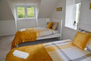 Un pat sau paturi într-o cameră la Balintombuie