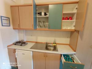 Kuchyň nebo kuchyňský kout v ubytování Hotel Giorgio + 37 fotografií