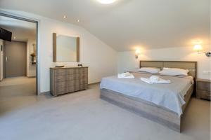 Un pat sau paturi într-o cameră la Haus Sofi
