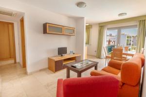 TV tai viihdekeskus majoituspaikassa Hotel LIVVO Corralejo Beach