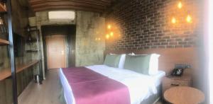 Postel nebo postele na pokoji v ubytování Meydan Besiktas Hotel