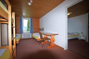 Postel nebo postele na pokoji v ubytování juhui Lenzerheide
