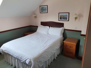 Postel nebo postele na pokoji v ubytování The Lugger Inn