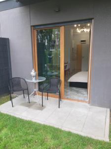 Patio nebo venkovní prostory v ubytování Na Grobli 20 Apartament z ogródkiem