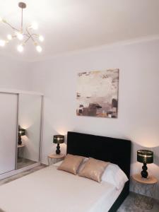 Postel nebo postele na pokoji v ubytování Na Grobli 20 Apartament z ogródkiem