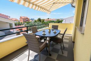 A balcony or terrace at Apartments Blatančić