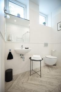 Kúpeľňa v ubytovaní Apartamenty Klasztorna 25