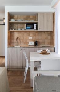 Kuchyňa alebo kuchynka v ubytovaní Apartamentos Sabina Playa