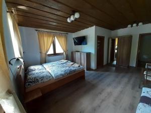 Postel nebo postele na pokoji v ubytování U Belianky