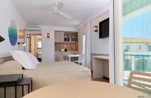 Posedenie v ubytovaní Apartamentos Sabina Playa