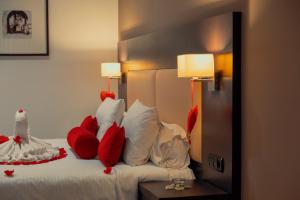 Postel nebo postele na pokoji v ubytování Hôtel Tamuda Beach