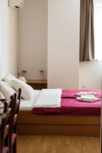 Postel nebo postele na pokoji v ubytování Hotel Klek