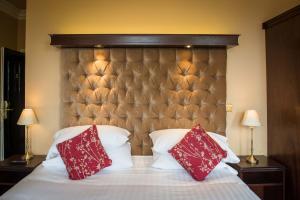 Uma cama ou camas num quarto em Gabriel House Guesthouse