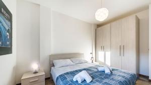 Cama ou camas em um quarto em Residenza Canal