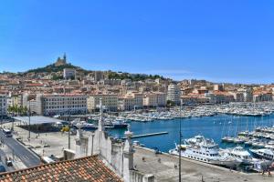 a view of a harbor with boats in the water at NOCNOC - Le Republique in Marseille
