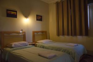 Hotel Pousada Do Leão客房内的一张或多张床位