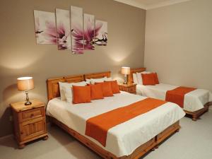 Ένα ή περισσότερα κρεβάτια σε δωμάτιο στο Duncan Guesthouse