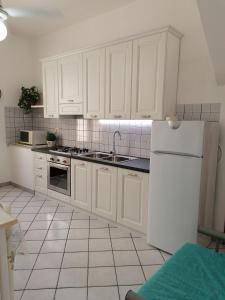 Kuchyň nebo kuchyňský kout v ubytování Casa Marcella San Vito Lo Capo