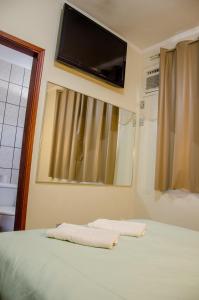 Hotel Pousada Do Leão客房内的一张或多张床位