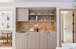 Kuchyňa alebo kuchynka v ubytovaní Apartamentos Sabina Playa